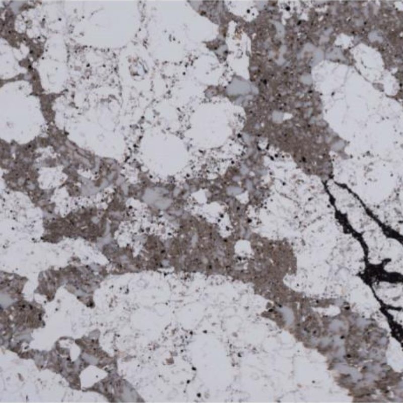 Mesa de quartzo sólido de cores diversas que parece mármore e granito