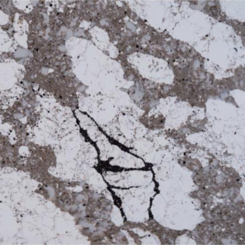Mesa de quartzo sólido de cores diversas que parece mármore e granito