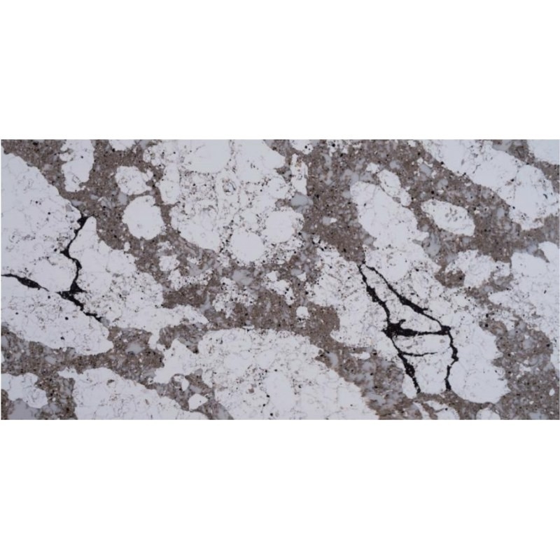 Mesa de quartzo sólido de cores diversas que parece mármore e granito